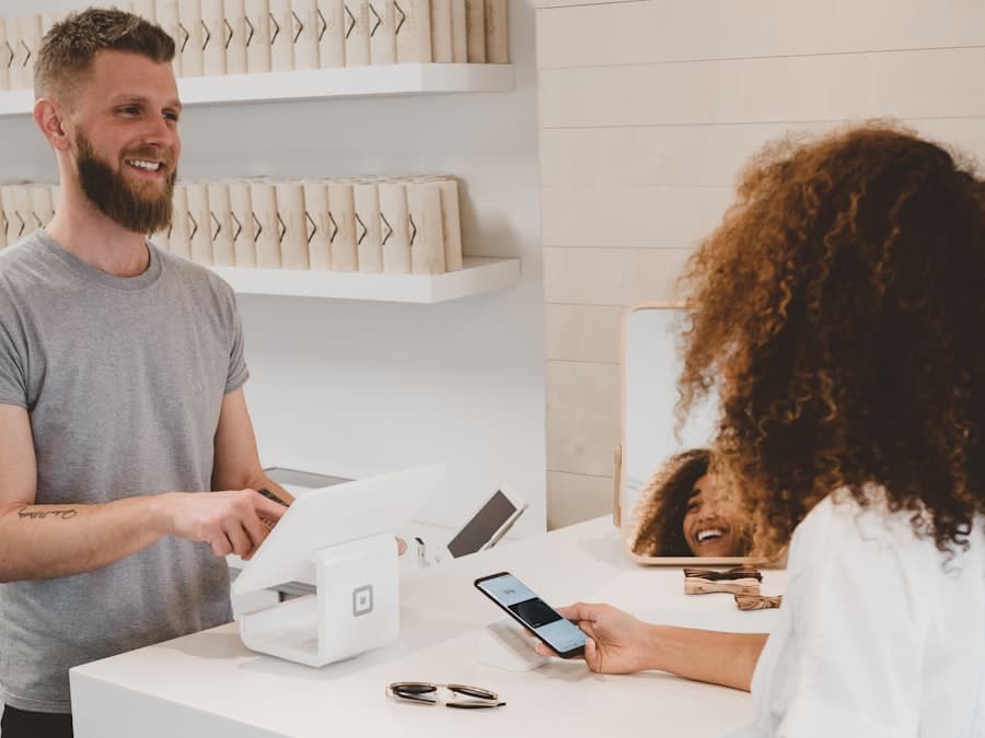 Happy customer completing a purchase at a retail counter